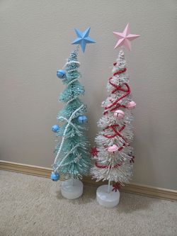 Two small christmas trees