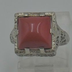 14kt white gold filigree  ring with princess cut coral stone 3 grams size 4.5 . mint condition. 862556-3.