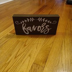 Favors Sign Brand New