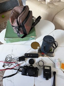 Canon A-1 35mm Film Camera Kit with Zoom, Flash and Bag