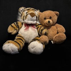 Tiger And Their Stuffed Animal