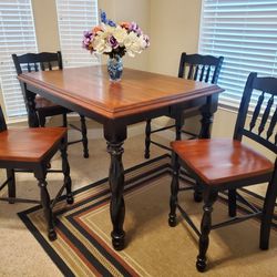Beautiful Dining Set. Table with 4 matching chairs. Good condition, sturdy. 