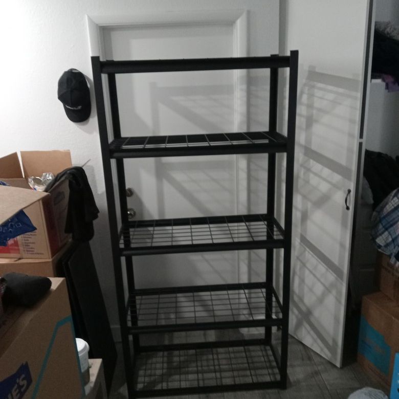 Metal Storage Rack. 5 Adjustable  Shelves. 