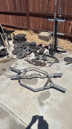 Weights, bench press, and pull down station