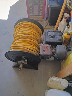 Cox Reel. And Motor. 300 Feet Hose