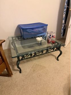 glass, top rot iron table A beautiful glass, top rot iron table