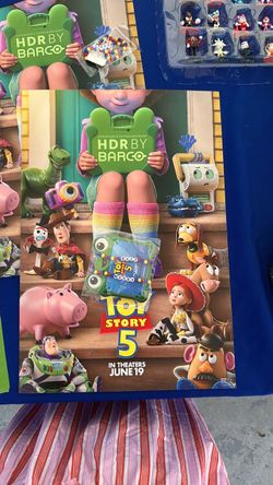 Pixar Toy Story 5 collectors poster with bracelets