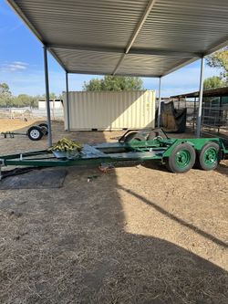 Homemade car trailer, beautiful control -heavy duty  -put trucks on - the car is gone. -Boat’s been on it. Just a great trailer 