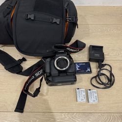 Canon EOS Rebel T3i DSLR Camera w/ Battery Grip, 2 Batteries, Charger & Bag