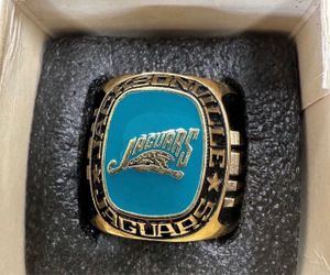 VINTAGE 1993 JAGUARS BANNED LOGO PAPERWEIGHT