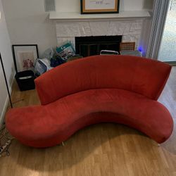 Unique Red Curved Sofa – Artistic & Sturdy