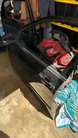 2003-2008 Toyota Corolla front driver door with molding