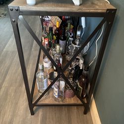 Bar table- metal  frame and gray light wood top and bottom.