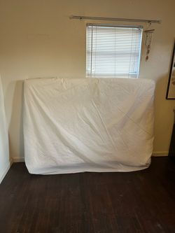 Mattress in Plastic Wrap