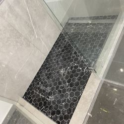 Laminate Flooring ,ceramic Tile, Framing ,kitchen ,interior Doors..