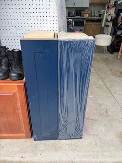 Two 9” wide x 36” tall x 12” deep Soft Close Door Blue Cabinets with 3 shelves
