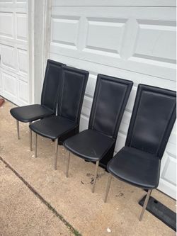 Set of 4 leather dining chairs