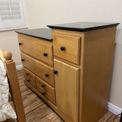 Wooden Dresser with Black Top