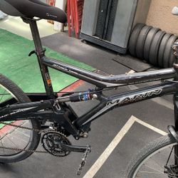 Marin country California 6061 with a quad link system designed by Jon White