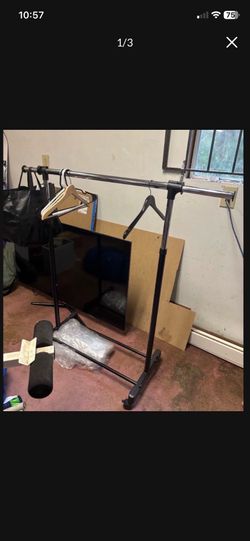 LOW PRICE MOVING- CLOTHING RACK COLLAPSABLE AND EXPANDABLE