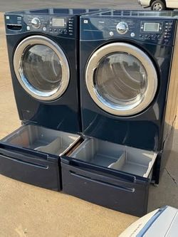 Blue Front load LG washer and front load front loadlg dryer electric  high efficiency with pedestals working perfectly extra for delivery same day del