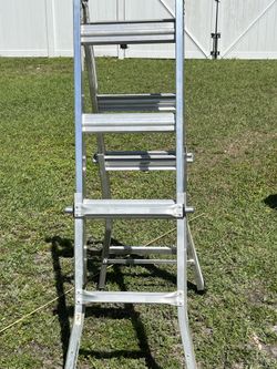 Gorilla ladder 13 position 5 feet high as a step ladder and 11 feet high straight up like new condition works perfect.