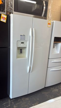 Like new GE side by side refrigerator