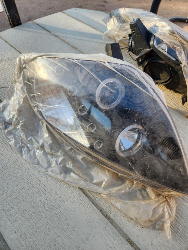 Headlight Assembly For A 2003 Nissian 350z