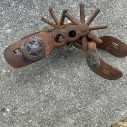 PAIR OF CAST IRON TEXAS RANGER SPURS...