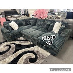 Dark gray jumbo corduroy sectional sleeper sofa with pull out bed 
