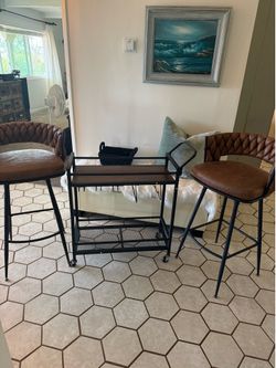 Two barstools and bark cart