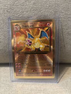 Pokemon Charizard Celebrations Ultra-Premium Collection Gold Metal in Mint Condition.