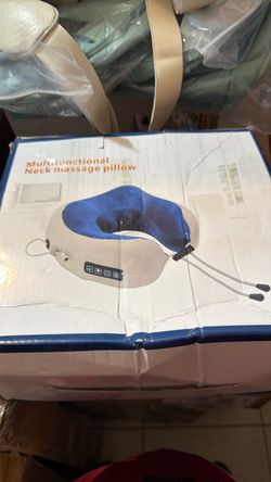 Travel neck pillow with massager