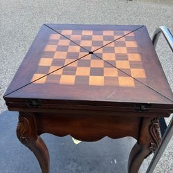 Peter Andrews Game Table. Folds, swivels 
