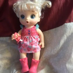 Girls doll and a small Potty.