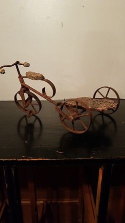 Antique toy very old metal bicycle