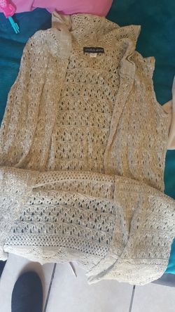 Knit no sleeve cardigan