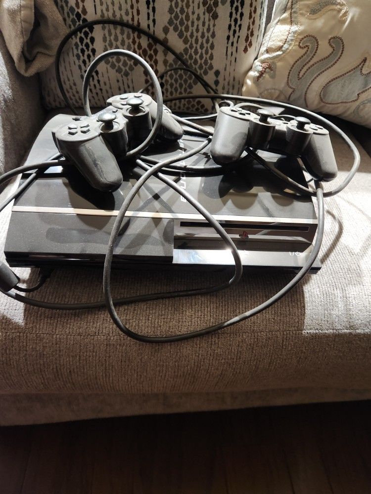 Playstation 3 Plus 2 Controllers