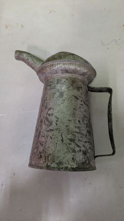 vintage galvanized metal oil filler can, commonly used in service stations  during the mid 1950s