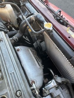 96 geo prizm. Red