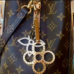 Louis Vuitton tapage keychain with box, dustbag & receipt