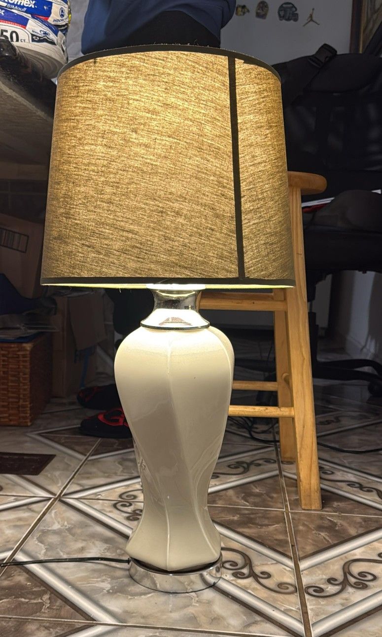 Modern table lamp with ceramic base and fabric shade
