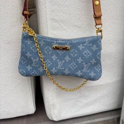 Blue monogram liv pochette bag
