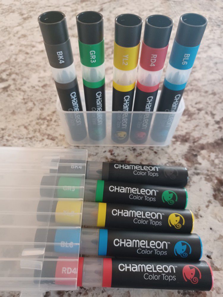 2 Packs "Chameleon" Color Tops. Brand New. Never Been Used