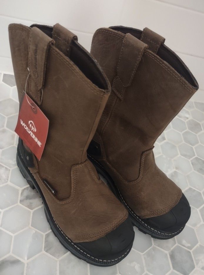 New wolverine steel toe/waterproof men work boot size 9