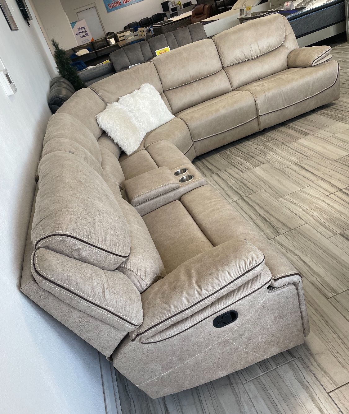 Winter Clearance Sale. Alejandra Tan Reclining Sectional Now $1599. Easy finance option. Same-day delivery.