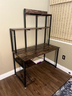 The computer desk has been disassembled for easy transport.