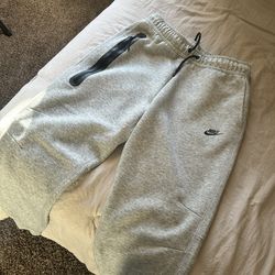 grey nike tech pants