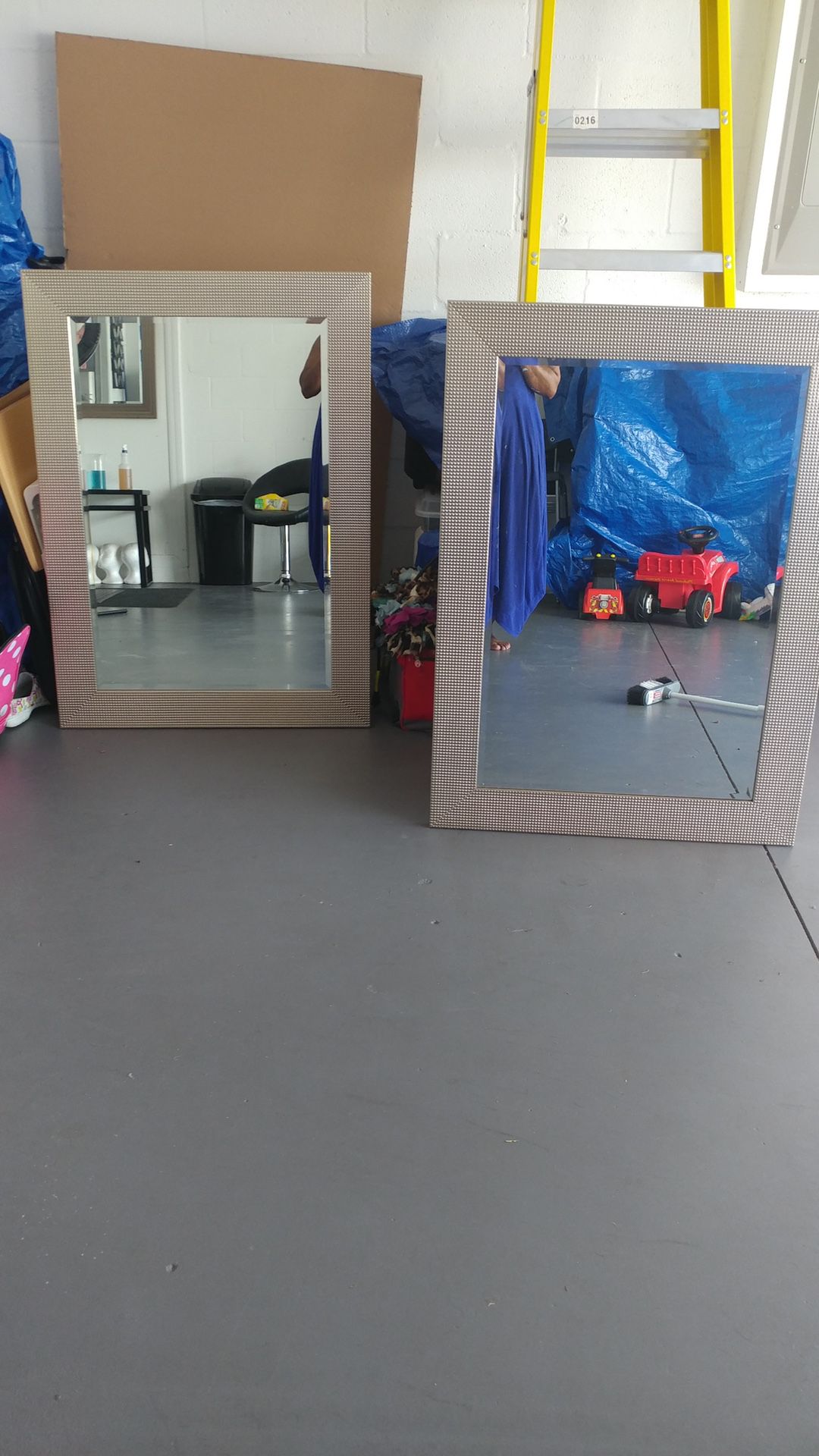 Two large wall mirrors