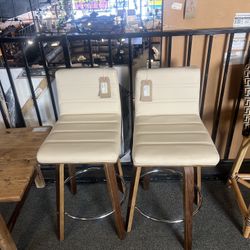 COUNTER STOOL: White faux leather seat & back - 2 tone finish wooden legs $99.00 XD3ZC4